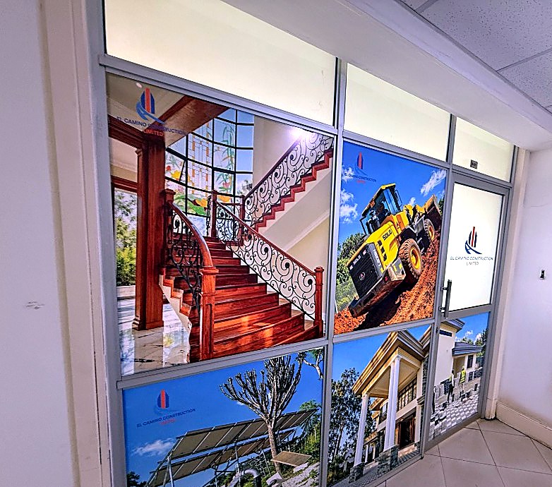 Project photography on the wall outside the El Camino Construction office